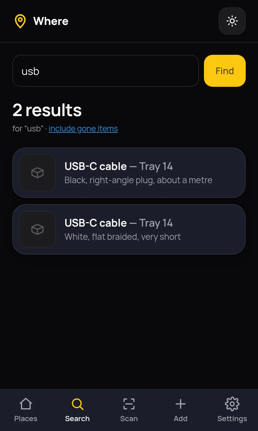 A search for the word usb in Where, returning two results. Each names the item and the place on one line, USB-C cable dash Tray 14, with a short description underneath saying black, right-angle plug, about a metre, and white, flat braided, very short.